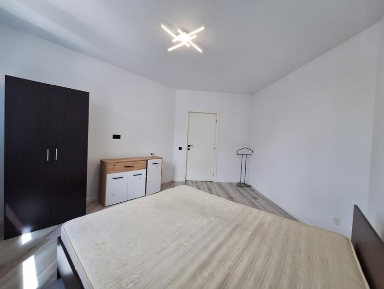 Apartament cu 3 camere semidecomandat, mobilat în Florești — fotografia 2