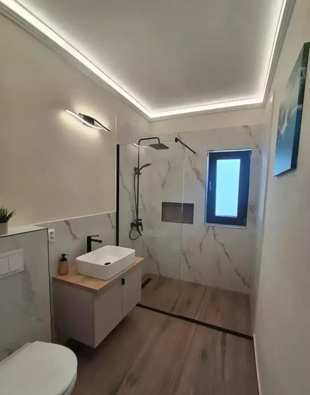 Apartament cu 2 camere semidecomandat, mobilat în Baciu