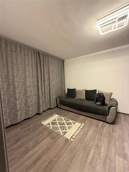 Apartament cu 2 camere semidecomandat, mobilat în Podu Roș