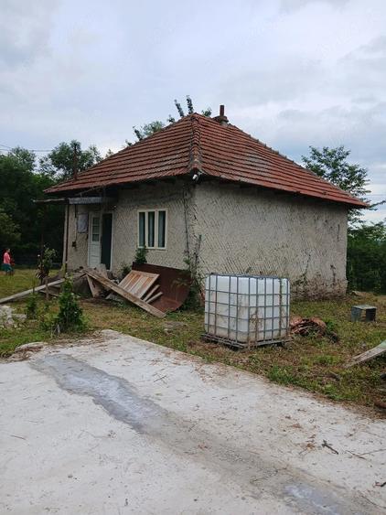 Casă cu Teren 1200 Mp în Bozioru