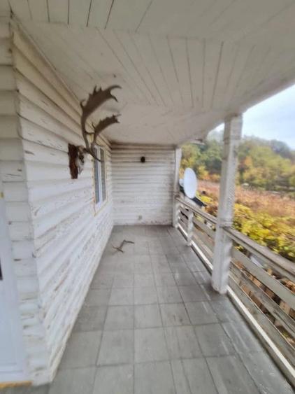 Casă cu Teren 1560 Mp în Crasna