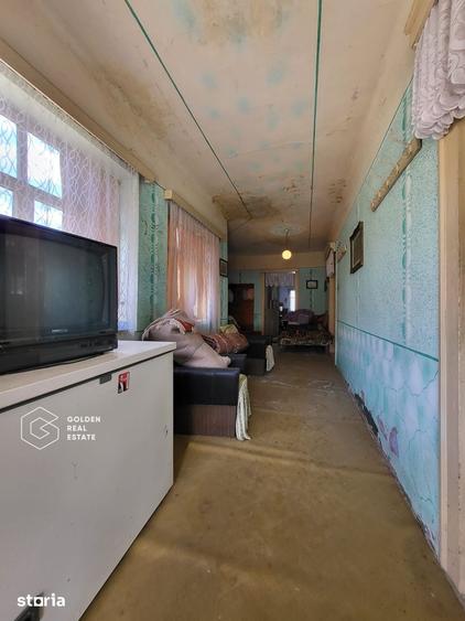 Casă cu 4 camere decomandat cu Teren 5000 Mp în Bârzava