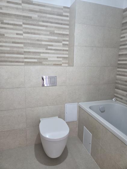Apartament cu 2 camere decomandat în Tractorul