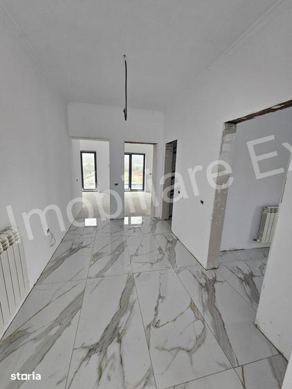 Casă cu 4 camere cu Teren 1000 Mp în Băiculești