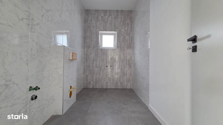 Casă cu 4 camere în Tunari