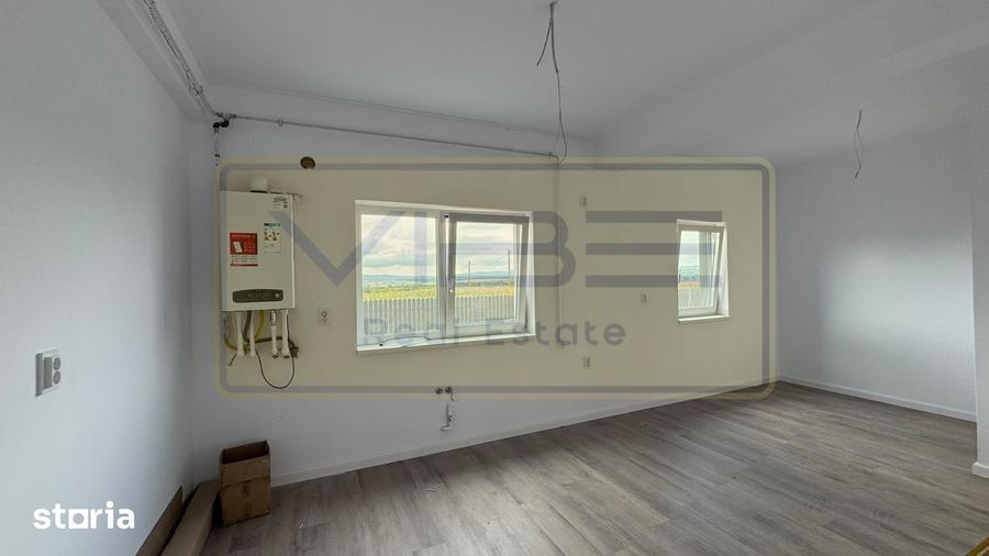 Casă cu 4 camere cu Teren 450 Mp în Valea Ursului