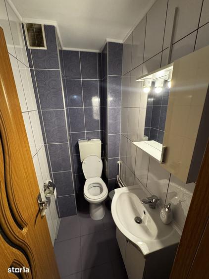 Apartament cu 3 camere decomandat în Tractorul