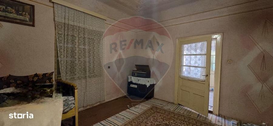 Casă cu 3 camere cu Teren 936 Mp în Socodor