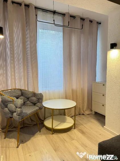 Apartament cu 3 camere semidecomandat în Dorobanți