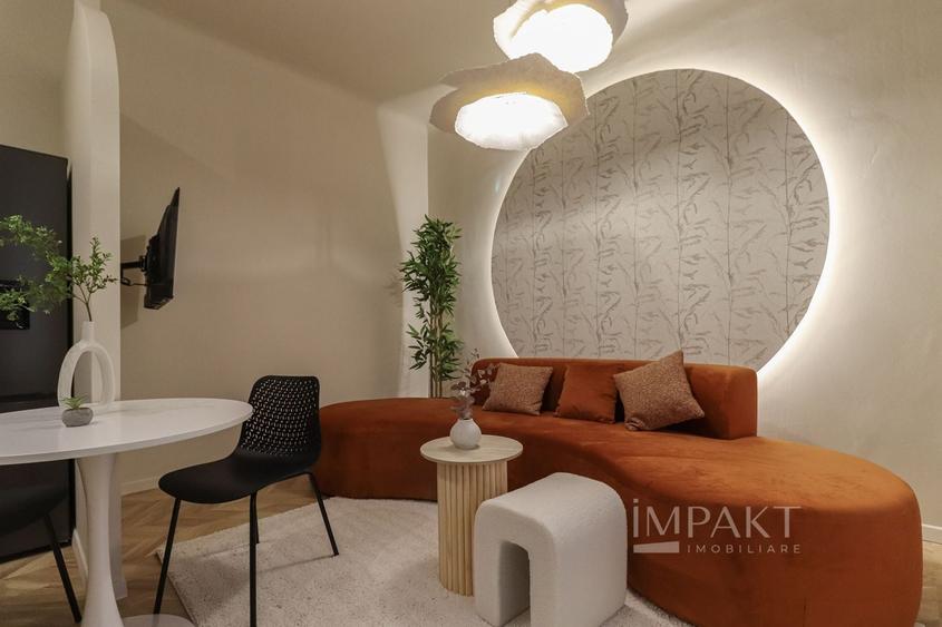 Apartament cu 2 camere semidecomandat, mobilat în Central