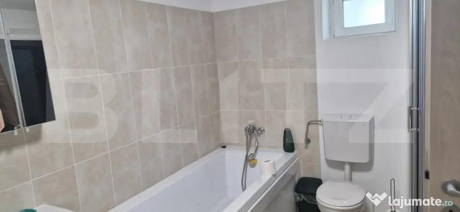 Casă cu 2 camere cu Teren 1000 Mp în Central