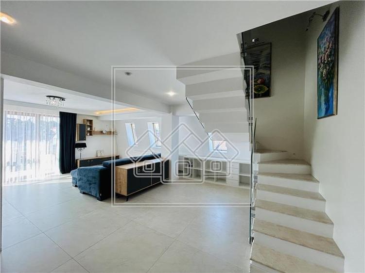 Ap pe 2 niveluri, 75 mp utili + 2 balcoane, mobilat modern - 11