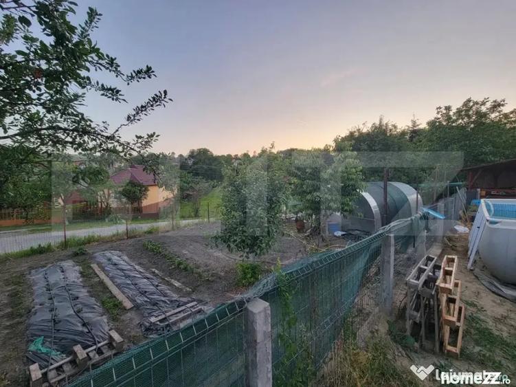 Casă cu 2 camere cu Teren 2000 Mp în Central