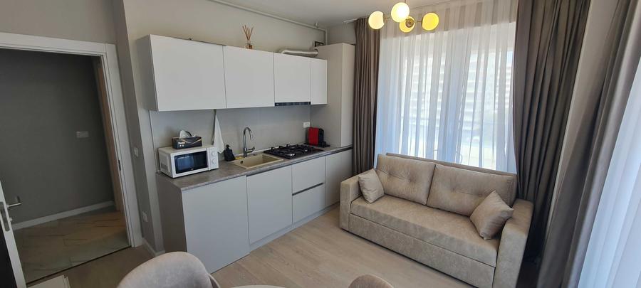 Apartament cu 2 camere semidecomandat, mobilat în Central