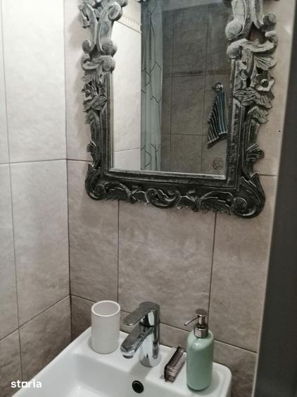 Apartament cu 3 camere în Romană