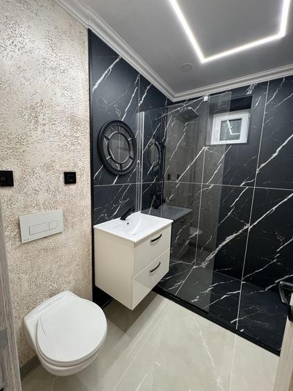 Apartament cu 4 camere decomandat în Central