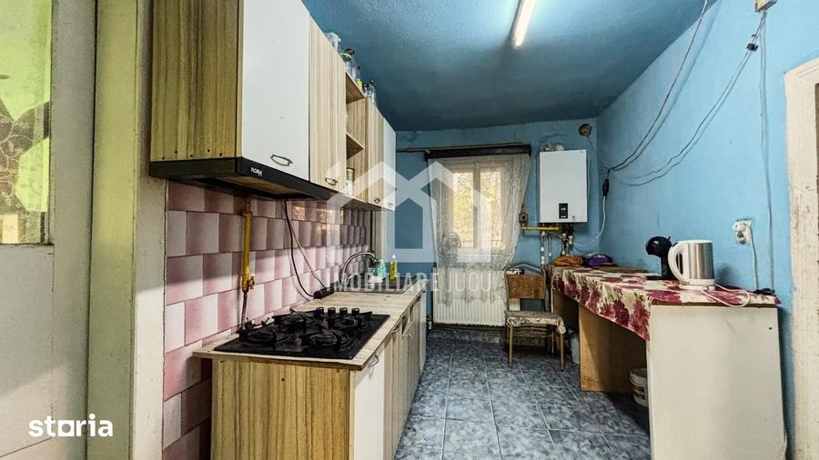 Casă cu 2 camere cu Teren 1200 Mp în Jucu