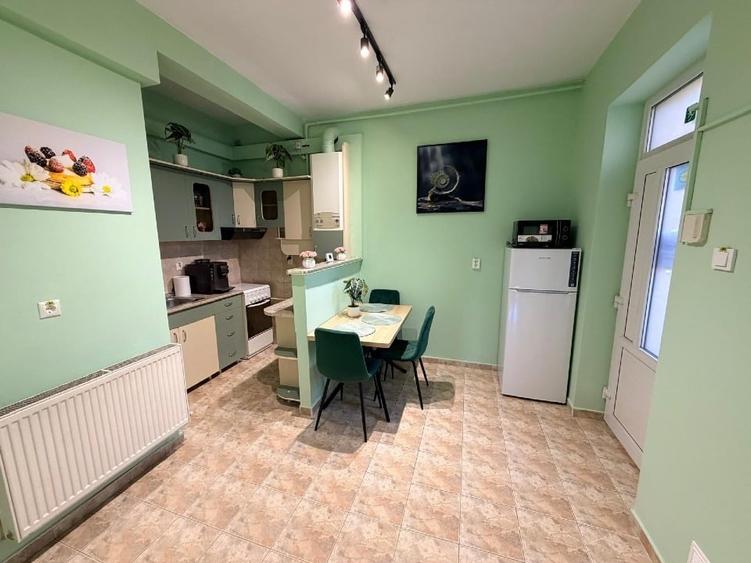 Apartament cu 2 camere semidecomandat, mobilat în Baciu