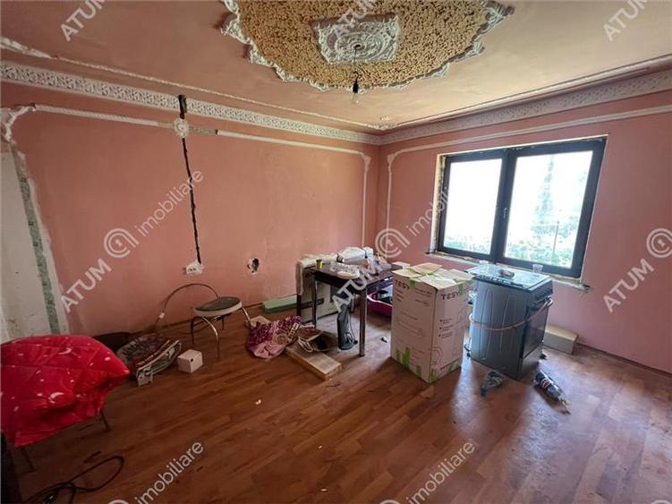 Casă individuală cu 5 camere cu Teren 489 Mp în Central