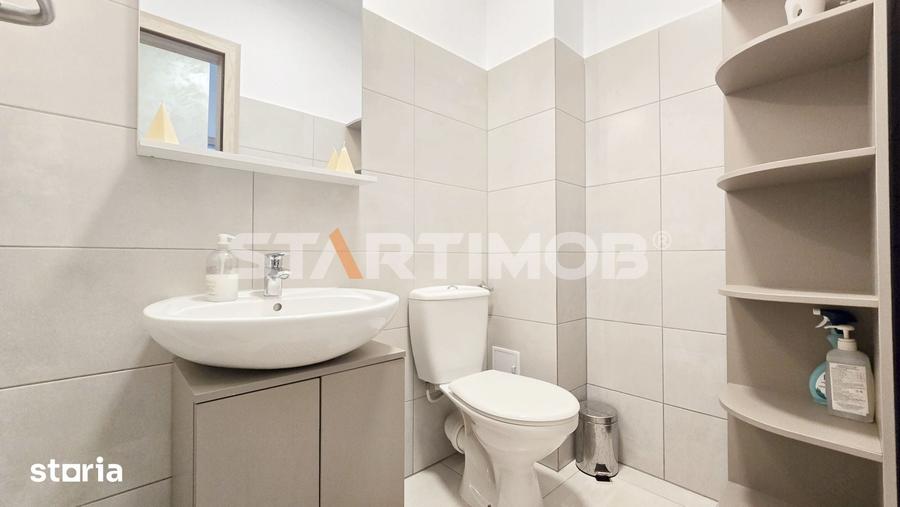 Apartament cu 3 camere decomandat în Tractorul