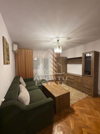 Apartament cu 2 camere semidecomandat, mobilat în Olimpia-Stadion