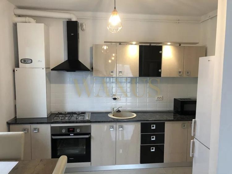 Apartament cu 2 camere semidecomandat, mobilat în Calea Moldovei