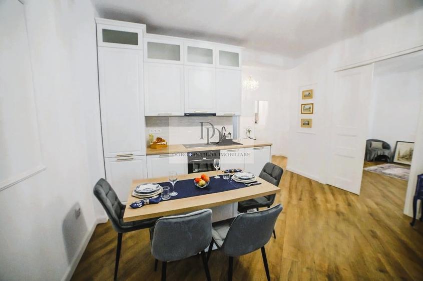 Apartament cu 3 camere semidecomandat, mobilat în Central