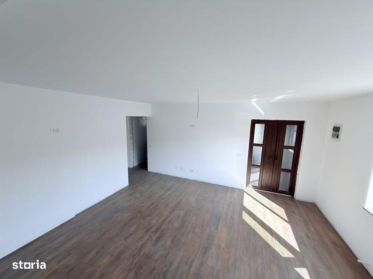 Casă cu 4 camere cu Teren 1300 Mp în Stăuceni