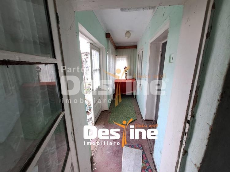Casă individuală cu 2 camere cu Teren 1250 Mp în Uricani