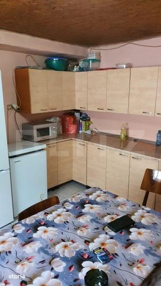 Casă cu 2 camere cu Teren 445 Mp în Piața Centrală