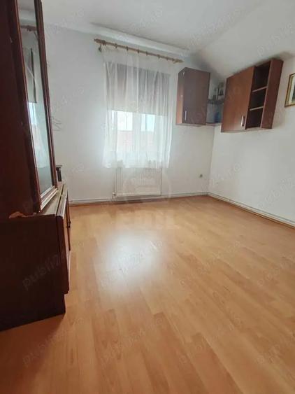 Casă cu 4 camere cu Teren 100 Mp în Central