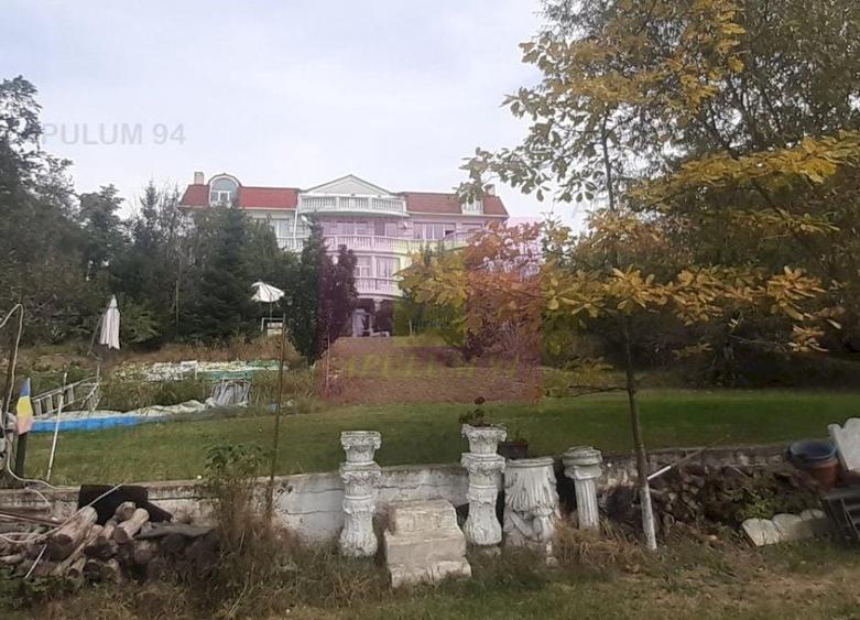 Casă individuală cu 15 camere decomandat cu Canalizare în Băneasa
