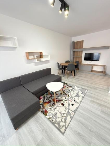 Apartament cu 2 camere semidecomandat, mobilat în Central