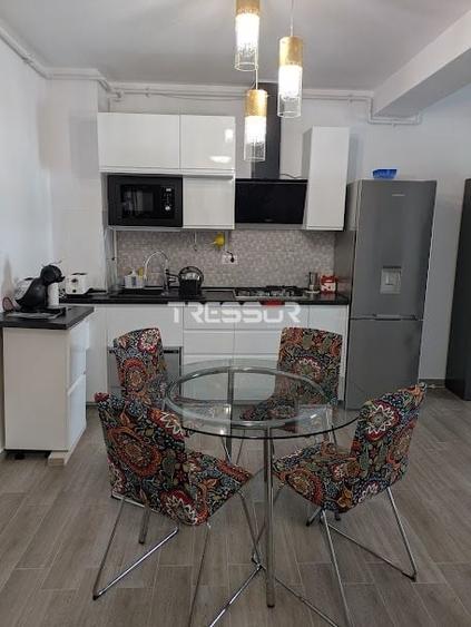 Apartament cu 2 camere semidecomandat, mobilat în Nord
