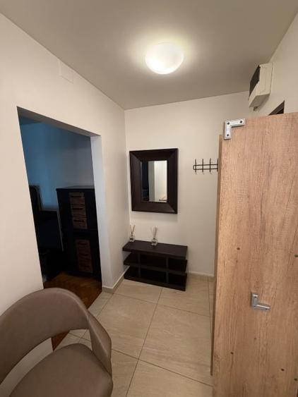 Apartament cu 2 camere semidecomandat, mobilat în Take Ionescu
