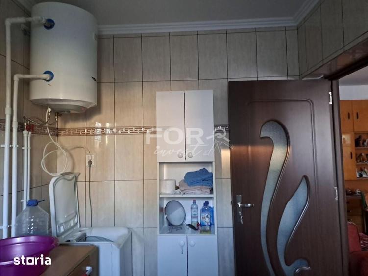 Casă cu 4 camere cu Teren 1900 Mp în Central