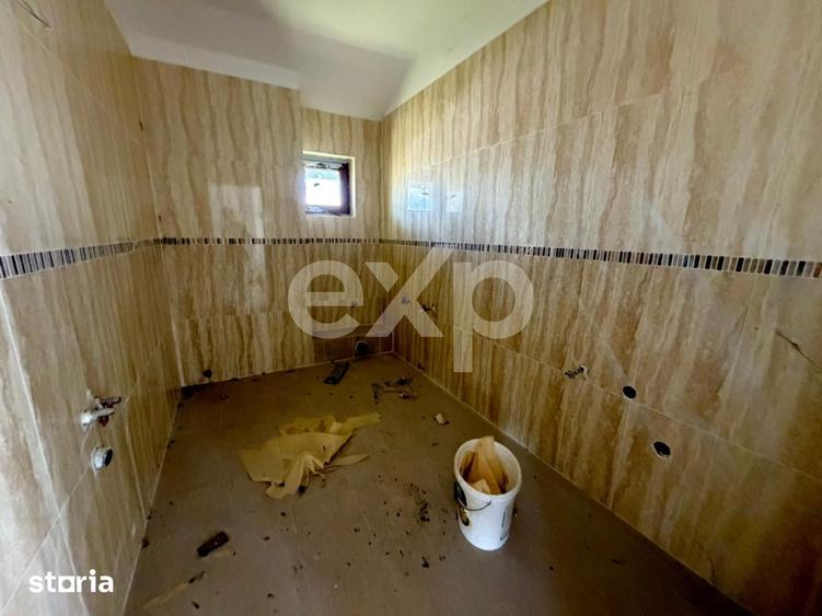 Casă cu 6 camere cu Teren 1000 Mp în Butimanu