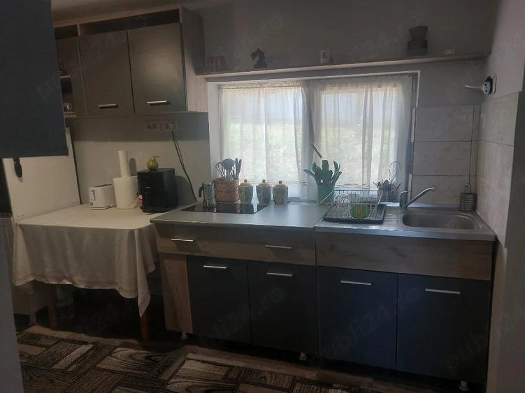 Casă cu 4 camere cu Teren 3400 Mp în Comarna