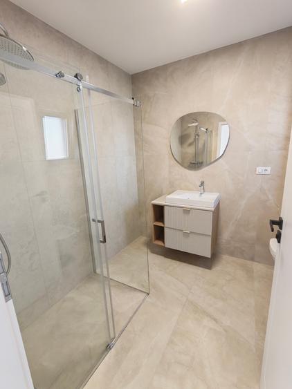 Apartament cu 2 camere semidecomandat, mobilat în Moșnița Nouă