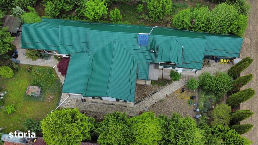 Casă cu 8 camere cu Teren 1000 Mp în Gârleni