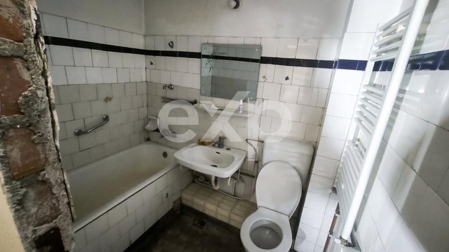 Apartament cu 4 camere decomandat în Central