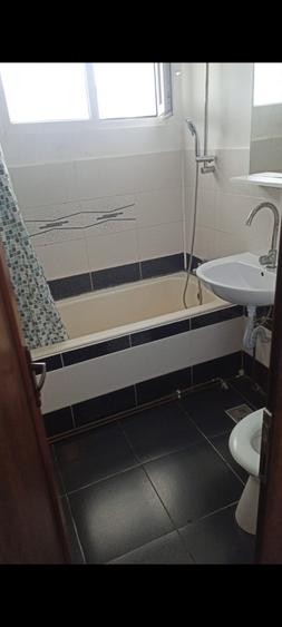 Apartament cu 2 camere semidecomandat în Podu Roș