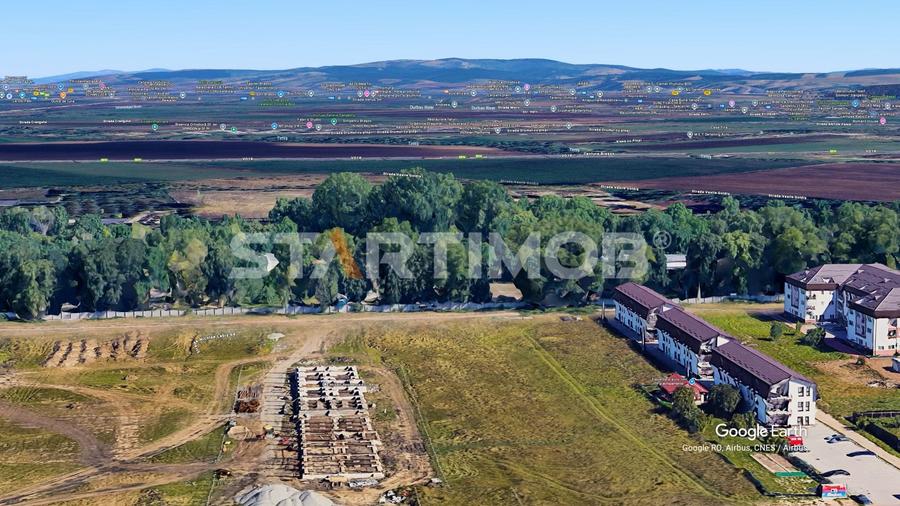 Teren Construcții intravilan de 2000 mp, în Tractorul