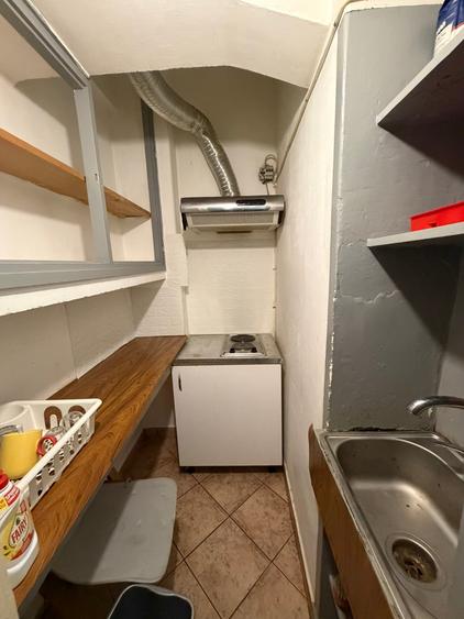 Cismigiu- Brezoianu,   garsoniera 30mp, parter, centrala proprie, zona linistita - 4