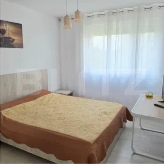 Apartament cu 2 camere semidecomandat, mobilat în Tractorul