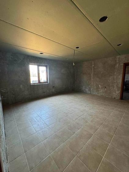Casă cu Teren 1130 Mp în Central