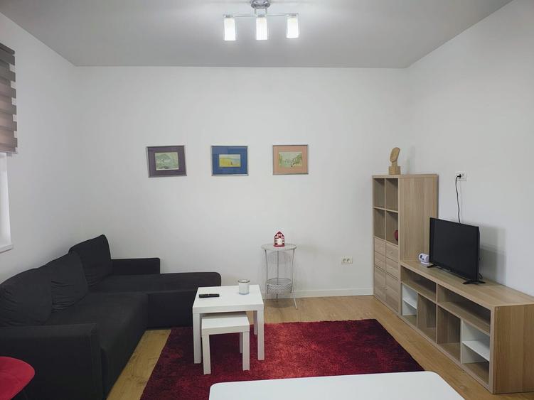 Apartament cu 2 camere semidecomandat, mobilat în Tunari