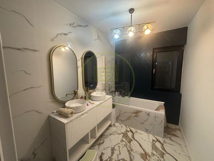 Casă individuală cu 4 camere cu Canalizare în Malu Mare