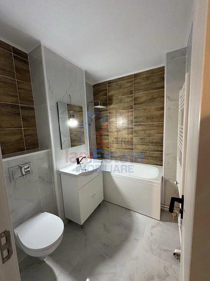 Apartament cu 4 camere decomandat în Filiași