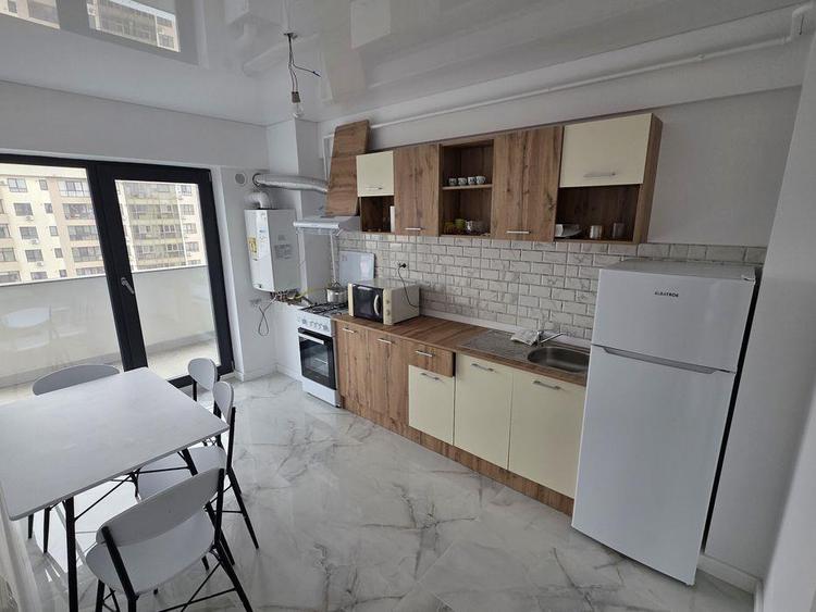 Apartament cu 2 camere decomandat în Cug